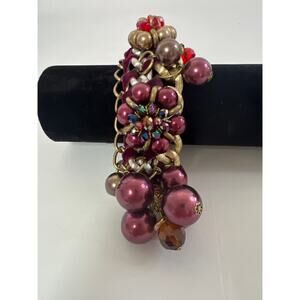 Dangling Burgundy Baubles Rhinestoned Center on Gold And Silver Toned Metal Link